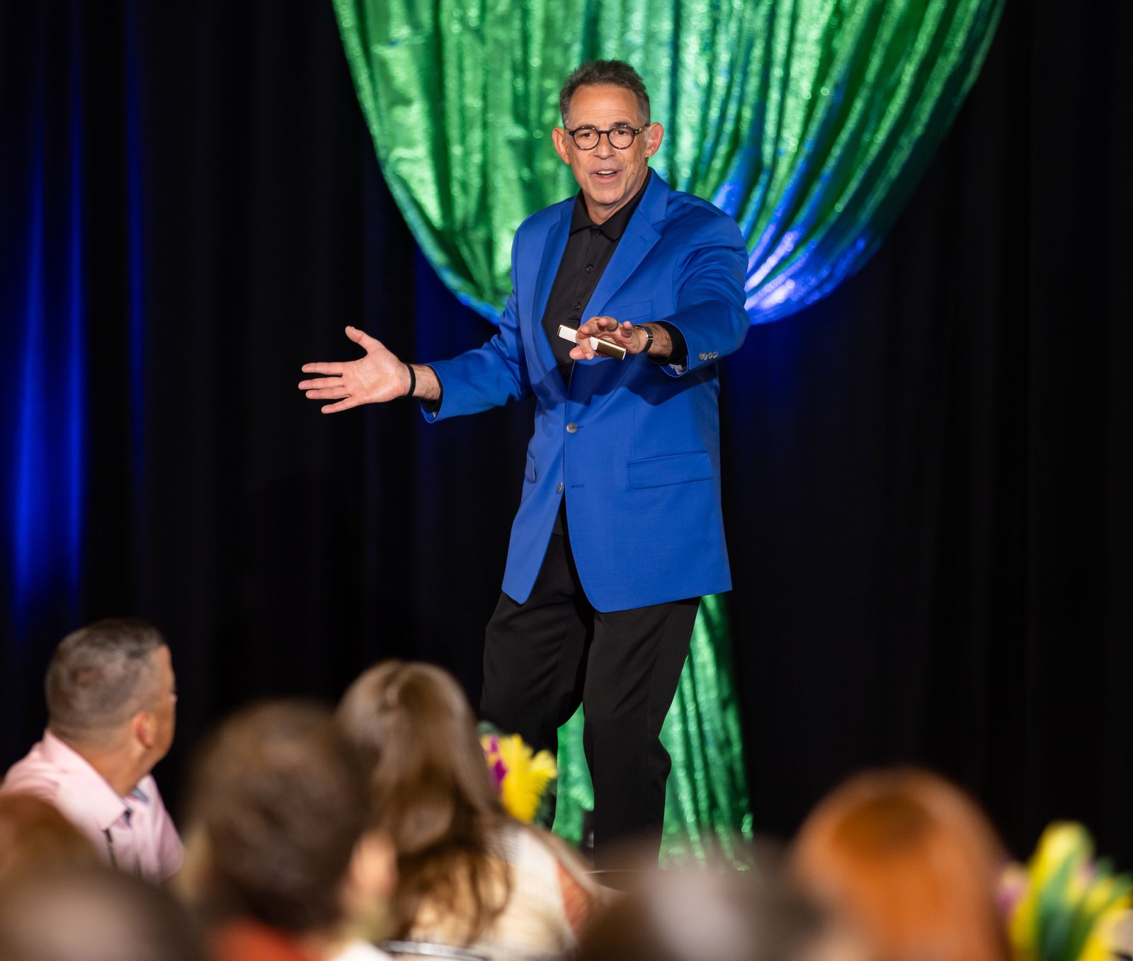 David Suson presenting on a conference main stage